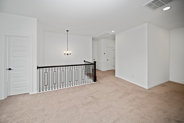 3437 Jaulan St, Leander, TX 78641 - additional living space with attic access, carpet flooring, baseboards, recessed lighting, and a chandelier