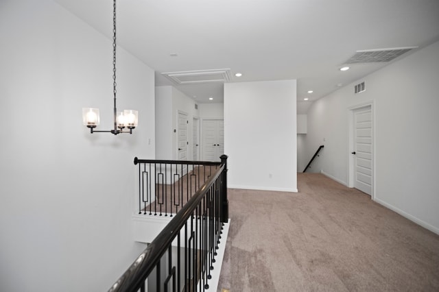 3437 Jaulan St, Leander, TX 78641 - hallway featuring an upstairs landing, attic access, carpet floors, recessed lighting, and baseboards