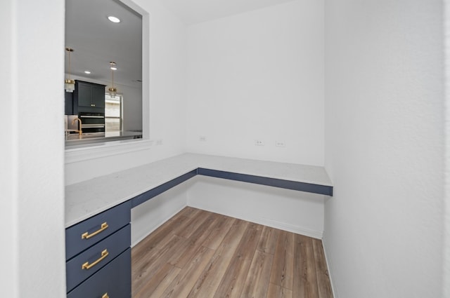 3437 Jaulan St, Leander, TX 78641 - unfurnished office with recessed lighting, wood finished floors, and baseboards