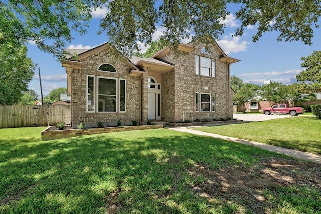 1605 Woods Blvd, Round Rock, TX 78681 - traditional-style home featuring brick siding