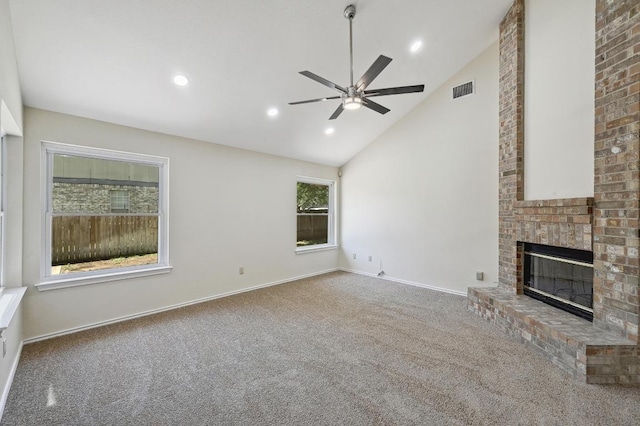 1605 Woods Blvd, Round Rock, TX 78681 - unfurnished living room featuring carpet, ceiling fan, a fireplace, high vaulted ceiling, and baseboards