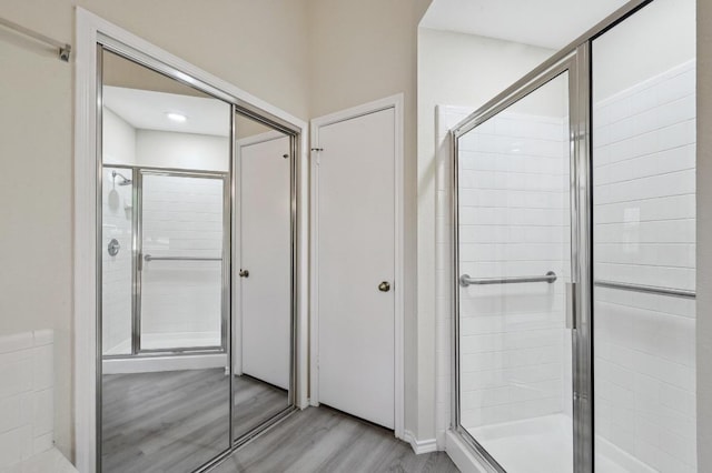1605 Woods Blvd, Round Rock, TX 78681 - full bath featuring wood finished floors and a shower stall