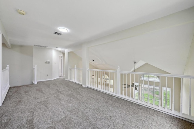 1605 Woods Blvd, Round Rock, TX 78681 - unfurnished room featuring carpet flooring, a smoke detector, and vaulted ceiling
