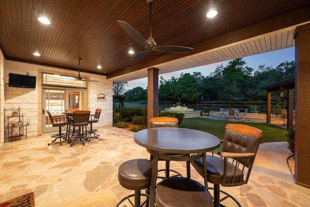611 Post Oak Dr, Dripping Springs, TX 78620 - view of patio with outdoor dining area, a ceiling fan, and fence
