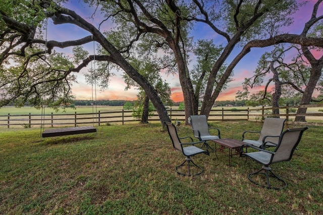 611 Post Oak Dr, Dripping Springs, TX 78620 - yard at dusk with a rural view