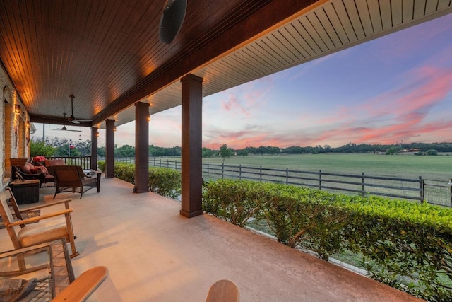 611 Post Oak Dr, Dripping Springs, TX 78620 - view of patio / terrace featuring ceiling fan, fence, a rural view, and outdoor lounge area
