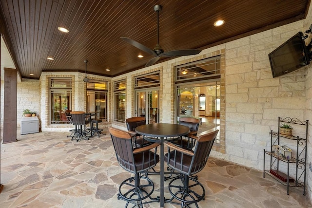 611 Post Oak Dr, Dripping Springs, TX 78620 - view of patio with outdoor dining space and a ceiling fan