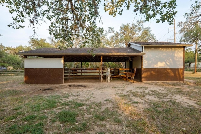 611 Post Oak Dr, Dripping Springs, TX 78620 - exterior space with an exterior structure, a carport, and an outdoor structure