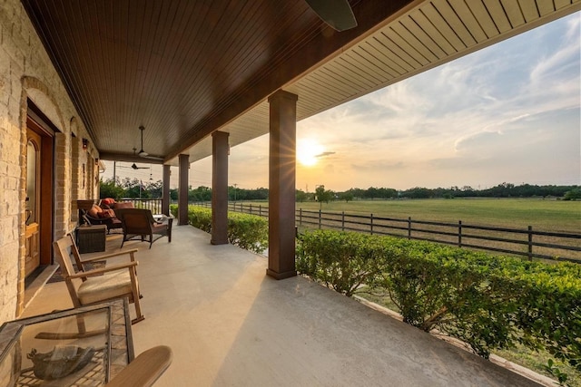 611 Post Oak Dr, Dripping Springs, TX 78620 - view of patio / terrace featuring ceiling fan, a rural view, fence, and covered porch