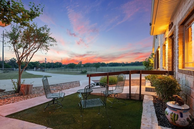 611 Post Oak Dr, Dripping Springs, TX 78620 - view of patio terrace at dusk