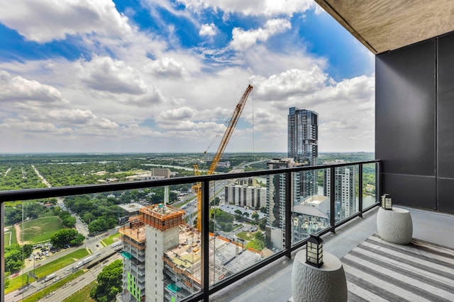 balcony featuring a view of city
