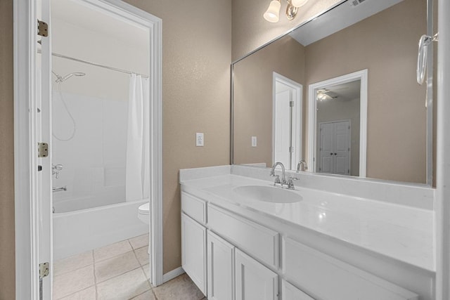 498 Aspen Cir, Killeen, TX 76549 - full bathroom featuring tile patterned floors, vanity, shower / bath combo with shower curtain, and toilet