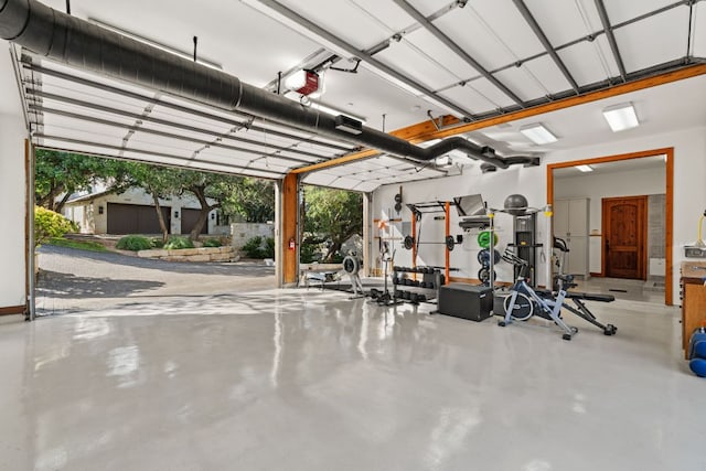 11949 Overlook Pass, Austin, TX 78738 - garage featuring a garage door opener