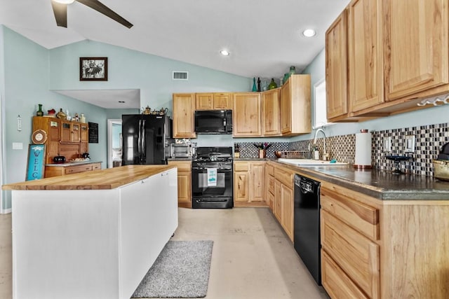 726 Mesa Dr, Del Valle, TX 78617 - kitchen with black appliances, a sink, light brown cabinets, butcher block counters, and vaulted ceiling