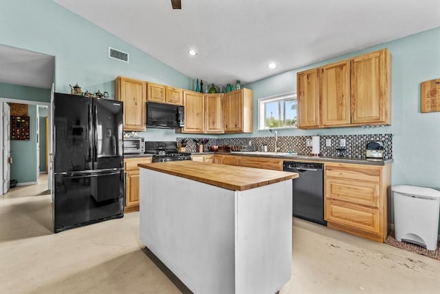 726 Mesa Dr, Del Valle, TX 78617 - kitchen with black appliances, wooden counters, finished concrete flooring, backsplash, and a sink