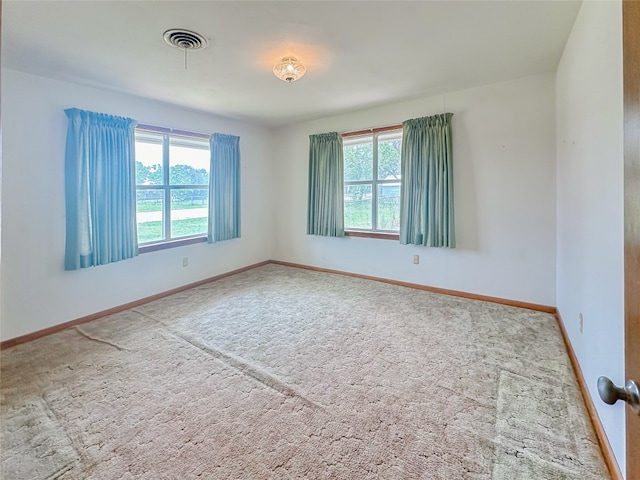 419 N Knox Ave, Giddings, TX 78942 - carpeted empty room with baseboards