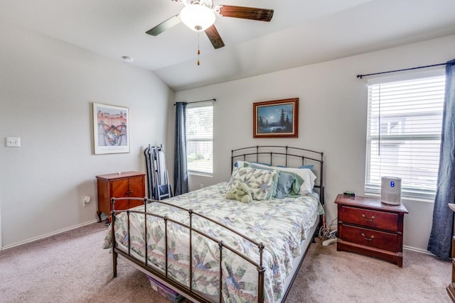 299 Andesite Trl, Buda, TX 78610 - bedroom with carpet flooring, baseboards, lofted ceiling, and a ceiling fan