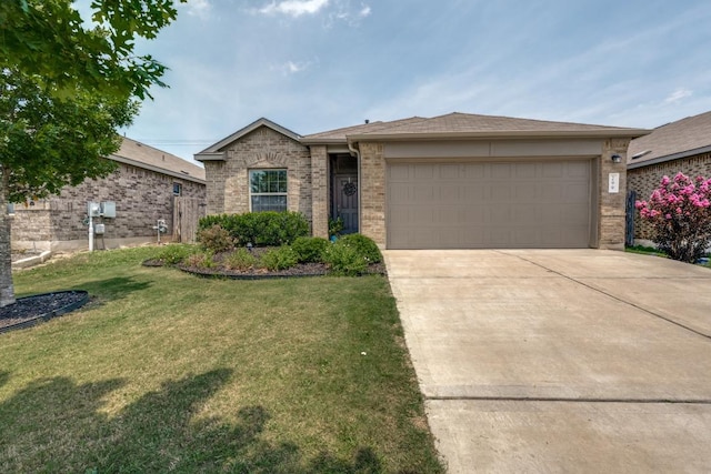 299 Andesite Trl, Buda, TX 78610 - ranch-style house featuring concrete driveway, an attached garage, a front lawn, and brick siding