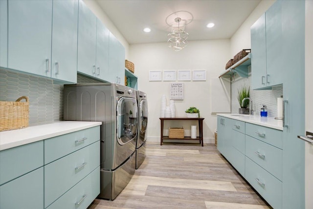 116 Wennmohs Pl, Horseshoe Bay, TX 78657 - washroom with independent washer and dryer, cabinet space, light wood finished floors, recessed lighting, and baseboards
