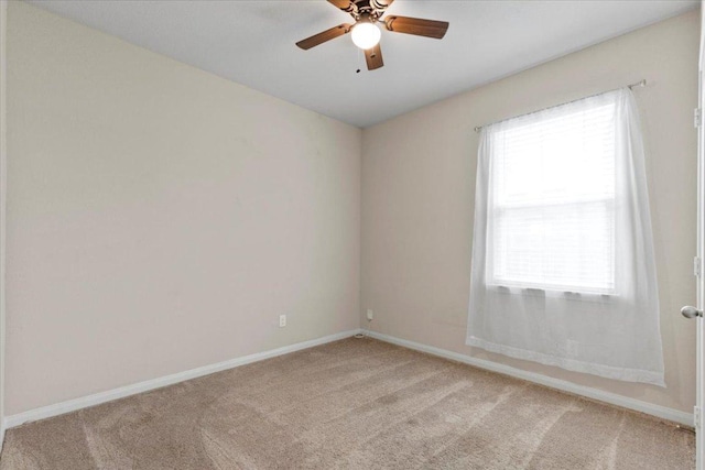 321 Freedom Park Ave, Liberty Hill, TX 78642 - unfurnished room featuring light carpet, baseboards, and ceiling fan