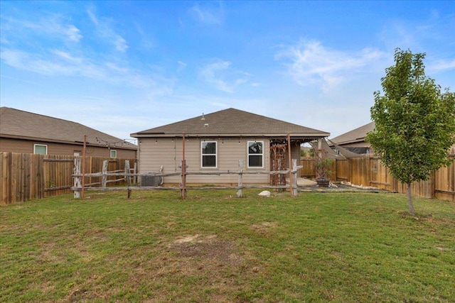 321 Freedom Park Ave, Liberty Hill, TX 78642 - back of property featuring central air condition unit and a patio