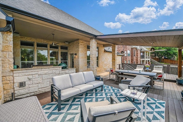 view of patio / terrace with an outdoor hangout area, a deck, and outdoor dining area
