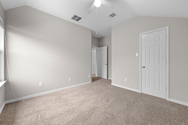 2640 Estefania Ln, Round Rock, TX 78665 - unfurnished bedroom featuring lofted ceiling, carpet floors, and a ceiling fan