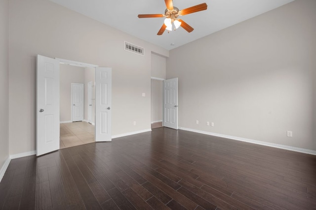 2640 Estefania Ln, Round Rock, TX 78665 - spare room with a ceiling fan, a high ceiling, and wood finished floors