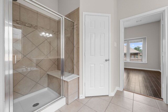 2640 Estefania Ln, Round Rock, TX 78665 - full bathroom with a stall shower and tile patterned flooring