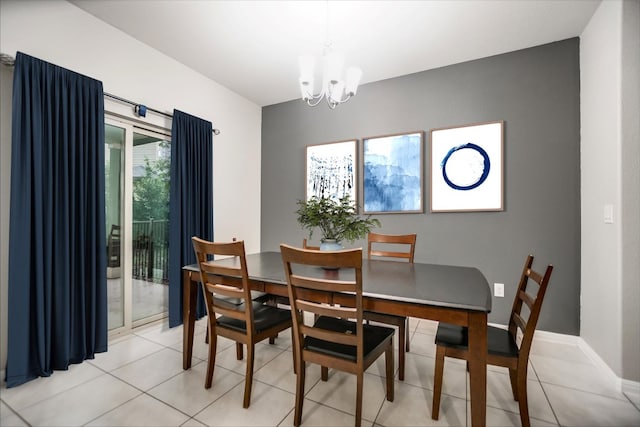 516 E Slaughter Ln Unit 1203, Austin, TX 78744 - dining room featuring a chandelier and light tile patterned floors