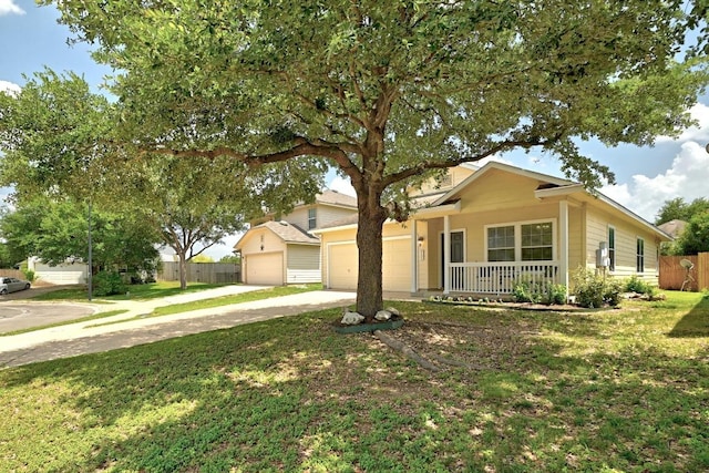 9403 Brandts Wood St, Austin, TX 78744 - view of front of home with driveway, a garage, and covered porch