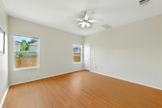 9403 Brandts Wood St, Austin, TX 78744 - empty room featuring wood finished floors and a ceiling fan