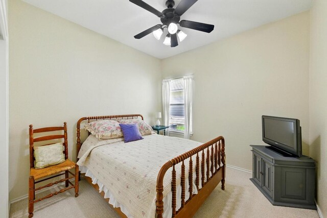 9403 Brandts Wood St, Austin, TX 78744 - bedroom with light colored carpet and ceiling fan