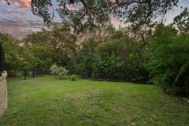 5503 Courtyard Dr, Austin, TX 78731 - view of yard at dusk