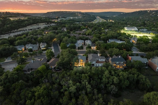 5503 Courtyard Dr, Austin, TX 78731 - aerial overview of property's location featuring nearby suburban area and mountains