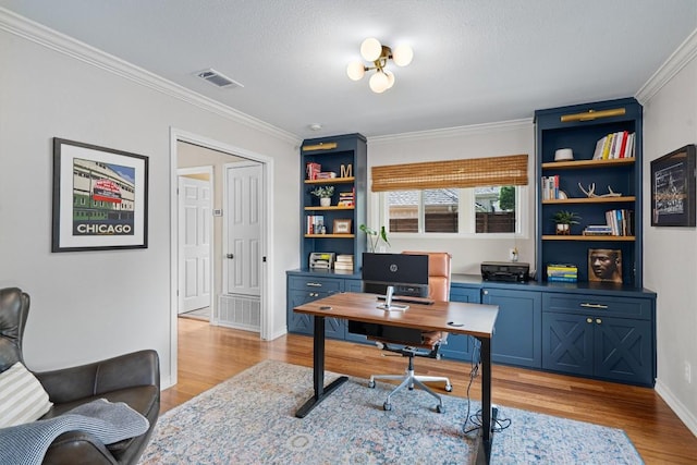 5503 Courtyard Dr, Austin, TX 78731 - office area with crown molding and light wood-style flooring