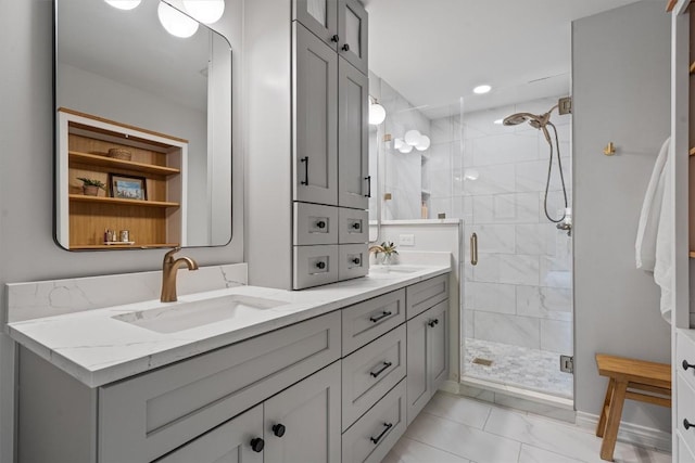 5503 Courtyard Dr, Austin, TX 78731 - bathroom featuring a stall shower, marble look tiles, and double vanity