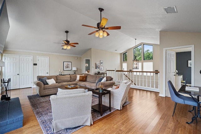 5503 Courtyard Dr, Austin, TX 78731 - living area featuring vaulted ceiling, light wood-style flooring, and a ceiling fan