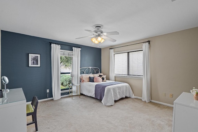 5503 Courtyard Dr, Austin, TX 78731 - bedroom featuring light colored carpet and ceiling fan