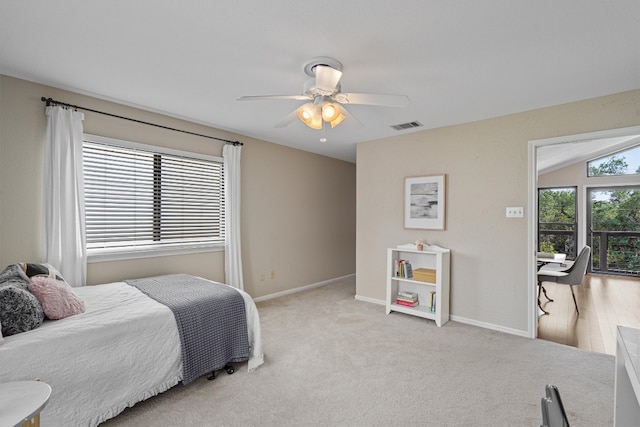 5503 Courtyard Dr, Austin, TX 78731 - carpeted bedroom with baseboards and a ceiling fan