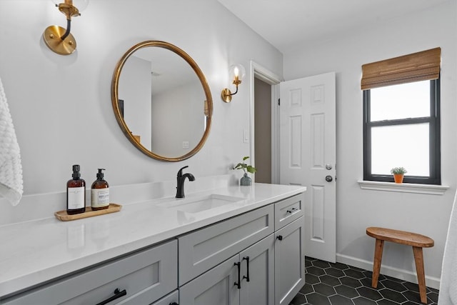 5503 Courtyard Dr, Austin, TX 78731 - bathroom with vanity, baseboards, and tile patterned flooring