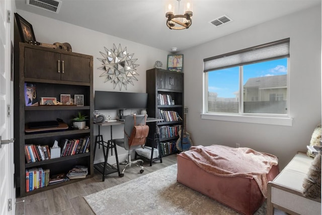 141 Witchhazel Way, San Marcos, TX 78666 - office with wood finished floors and a chandelier