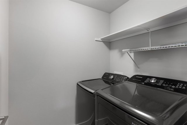 141 Witchhazel Way, San Marcos, TX 78666 - laundry room with washing machine and dryer