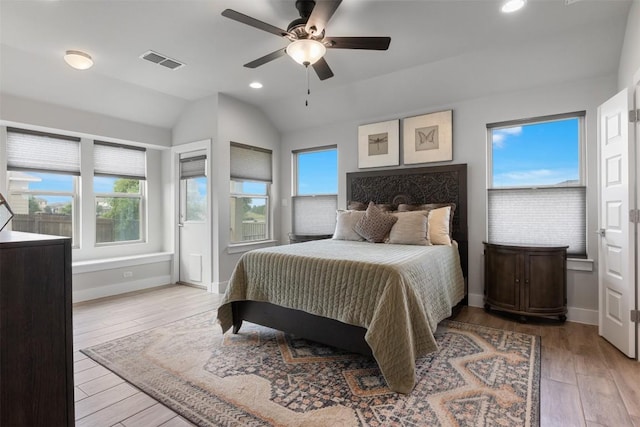 141 Witchhazel Way, San Marcos, TX 78666 - bedroom featuring vaulted ceiling, light wood-type flooring, recessed lighting, baseboards, and ceiling fan