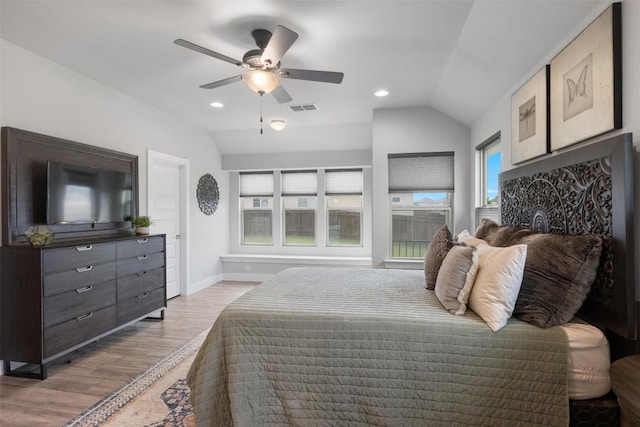141 Witchhazel Way, San Marcos, TX 78666 - bedroom featuring vaulted ceiling, wood finished floors, recessed lighting, and a ceiling fan