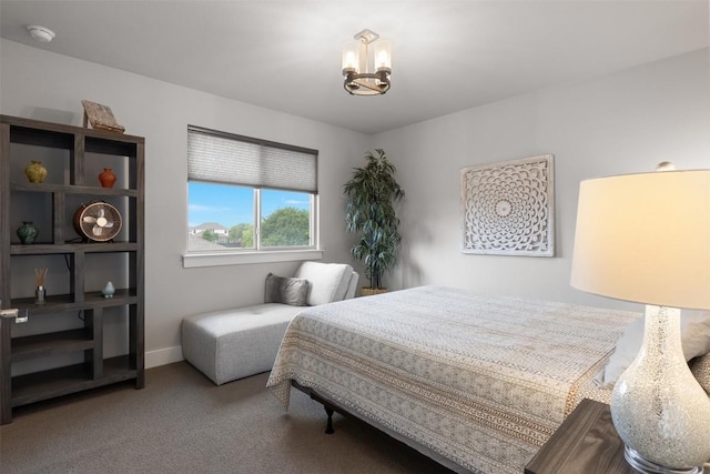 141 Witchhazel Way, San Marcos, TX 78666 - carpeted bedroom featuring a chandelier and baseboards