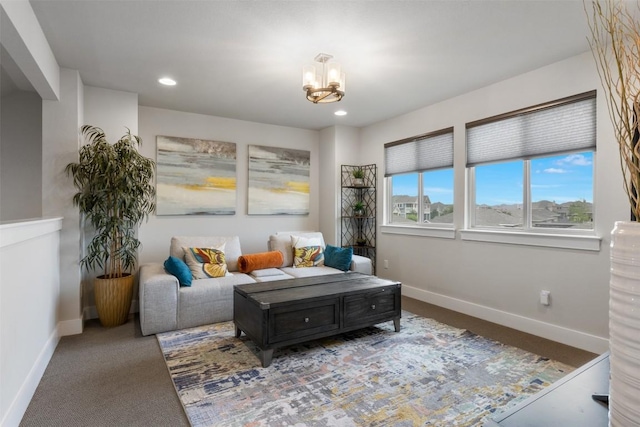 141 Witchhazel Way, San Marcos, TX 78666 - living area featuring baseboards, a chandelier, and recessed lighting