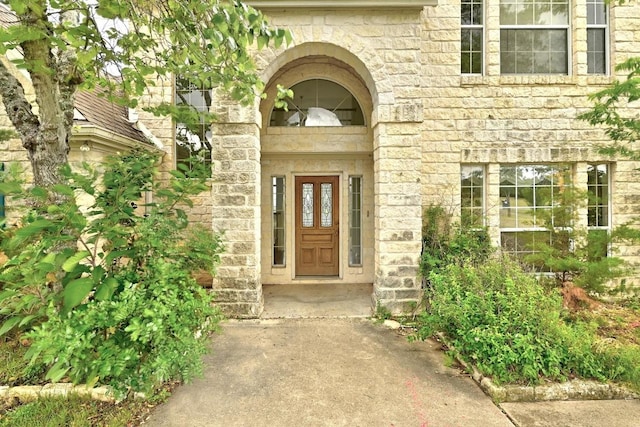 3 Coach House Rd, Austin, TX 78737 - view of exterior entry featuring stone siding