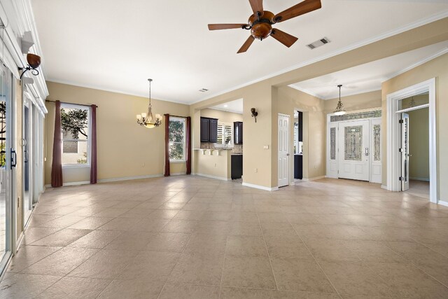 214 Lone Star Dr, Georgetown, TX 78633 - unfurnished living room featuring a chandelier, baseboards, crown molding, and ceiling fan