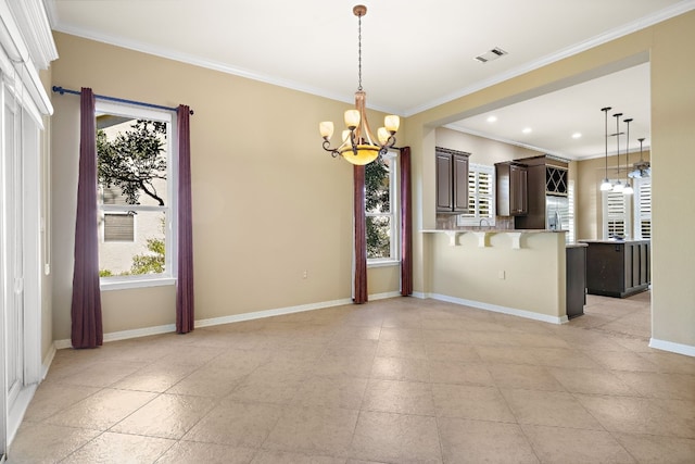 214 Lone Star Dr, Georgetown, TX 78633 - empty room with a chandelier, baseboards, ornamental molding, and recessed lighting